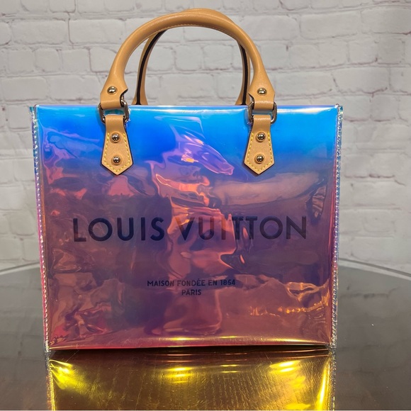 Louis Vuitton Handbags - LOUIS VUITTON gift bag wrapped in iridescent PVC turned into a tote & crossbody